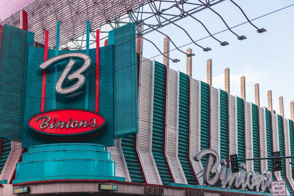 Vibrant facade of Binion's Casino in downtown Las Vegas, showcasing classic neon signs and architecture.