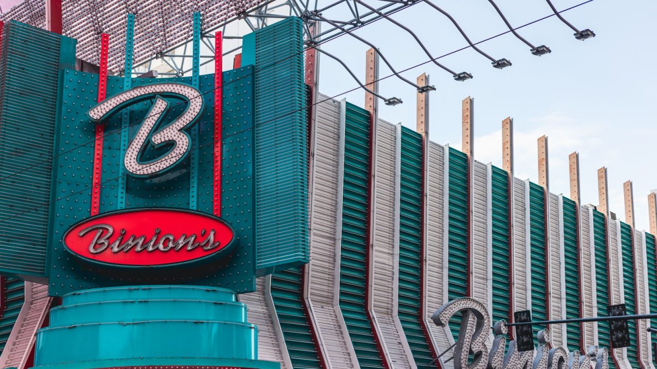 Vibrant facade of Binion's Casino in downtown Las Vegas, showcasing classic neon signs and architecture.